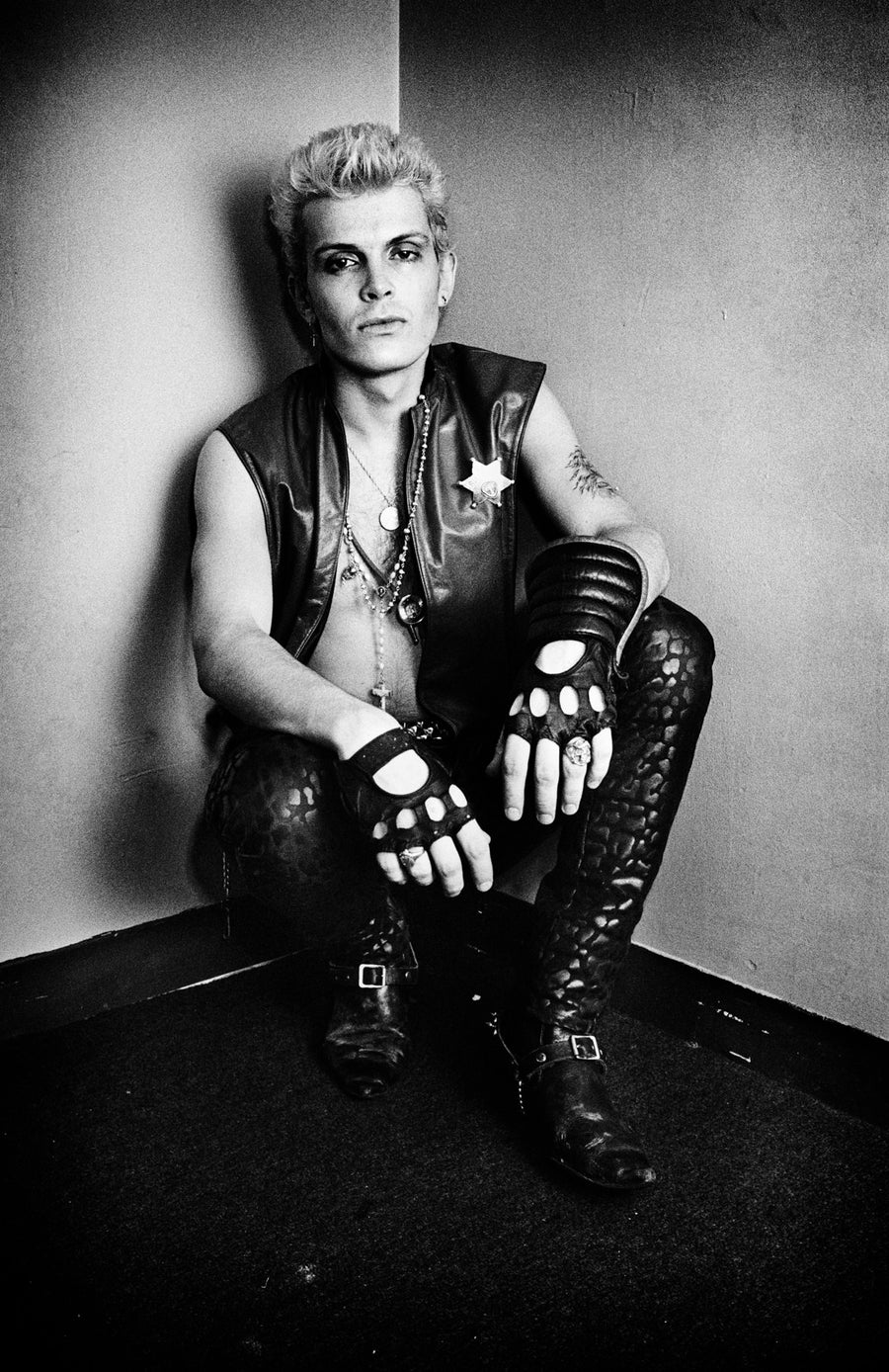 Billy Idol seated portrait, Boston, Massachusetts, 1982, photographed by Michael Grecco.