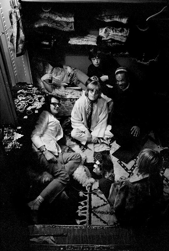 Brian Jones, Mick Jagger, Keith Richards, Anita Pallenberg and Robert Fraser at a Morocco rug shop, photographed by Michael Cooper, 1967.