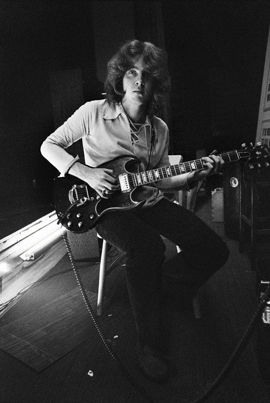 Mick Taylor playing a Gibson guitar at the Rolling Stones' Hyde Park rehearsals, photographed by Michael Cooper, 1969.
