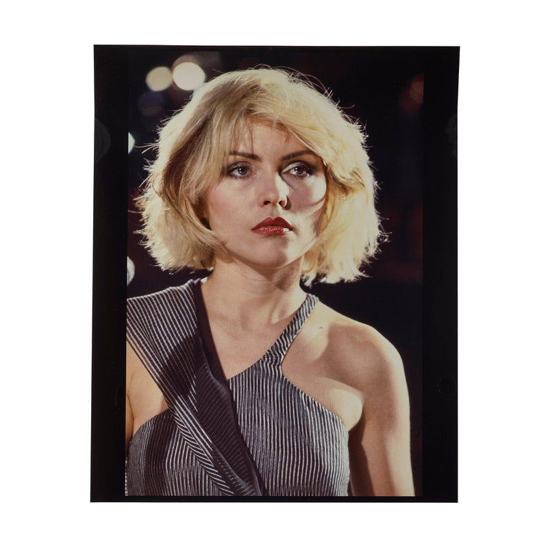 Debbie Harry on the set of Blondie's Heart of Glass video, three-quarter portrait with her gaze turned to the side, photographed by Roberta Bayley, 1978.