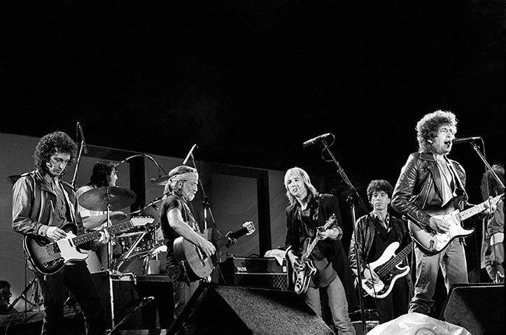 Bob Dylan, Tom Petty and Willie Nelson, Illinois, 1985. Photograph by Ebet Roberts.