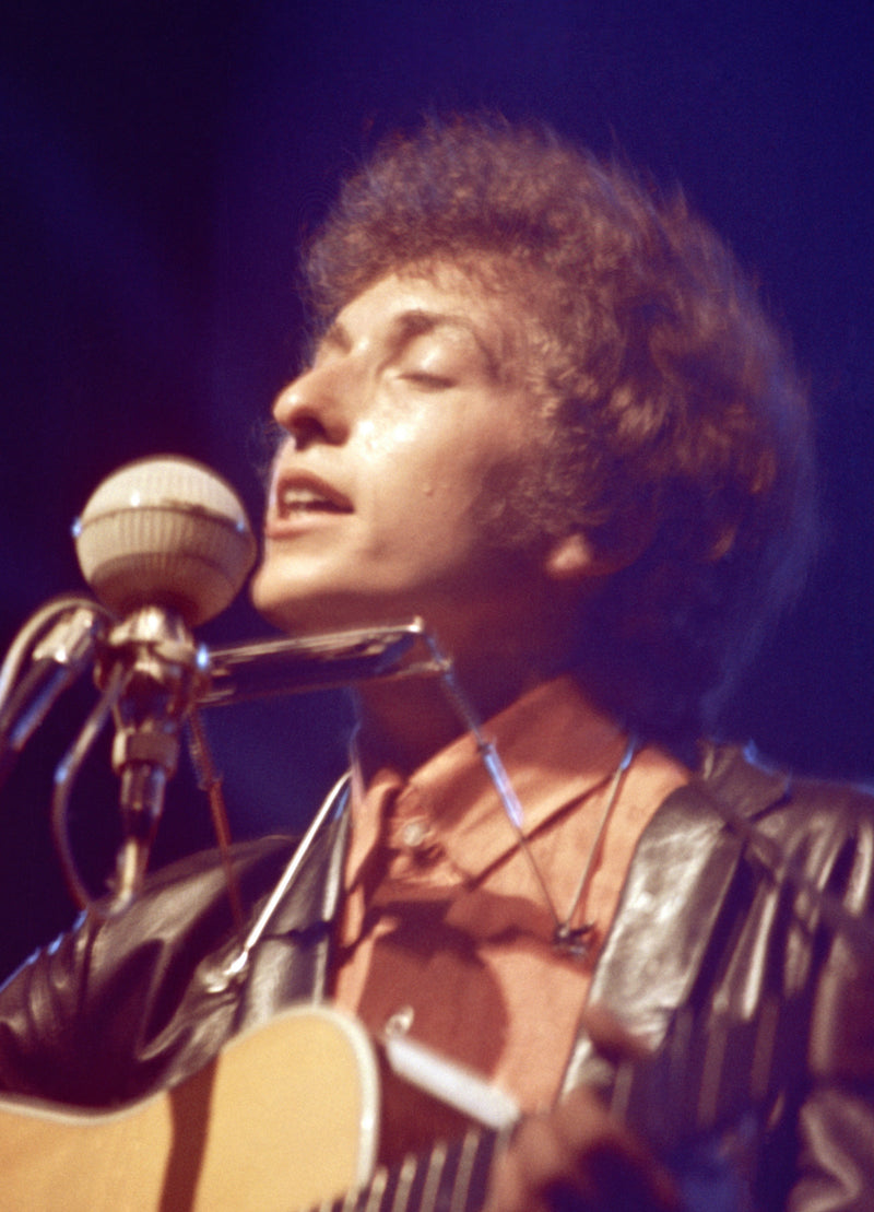 Bob Dylan performing at the Newport Folk Festival in Newport, Rhode Island, on July 25, 1965. Vintage chromogenic print by Bob Gruen from the photographer's personal archive.