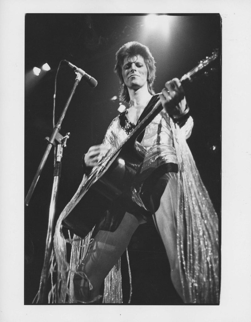 David Bowie performing live, photographed by Mick Rock. Unique vintage gelatin silver print.
