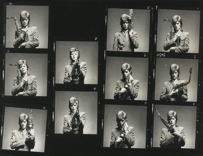 David Bowie photographed in London by Mick Rock in the early 1970s. Unique vintage gelatin silver print.