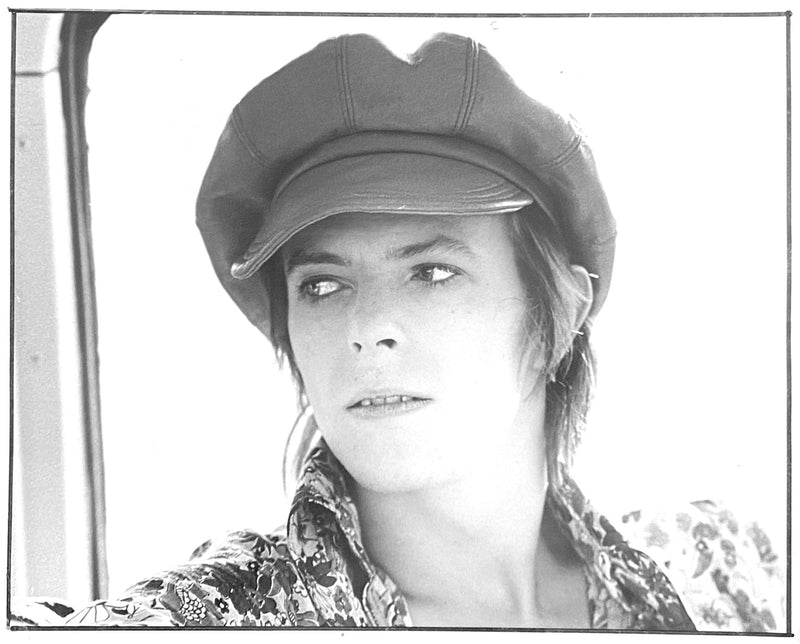 David Bowie on the train to Amsterdam, 1973, photographed by Mick Rock. Unique vintage gelatin silver print.