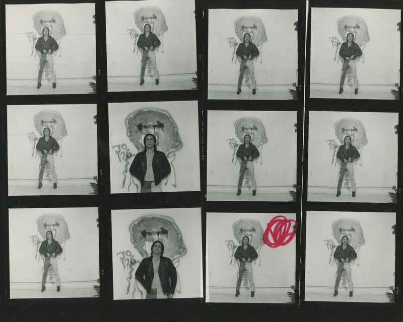 Original contact sheet of Iggy Pop against a spray-painted background, New York City, 1980, by Mick Rock. Unique vintage gelatin silver print.