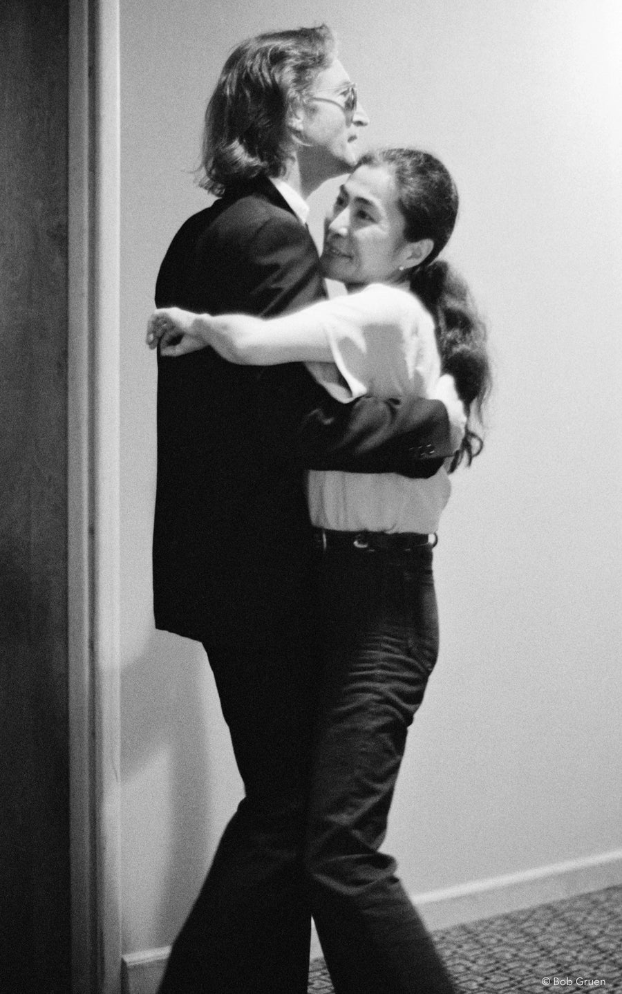 John Lennon and Yoko Ono dancing at The Hit Factory in New York City, 1980, photographed by Bob Gruen.