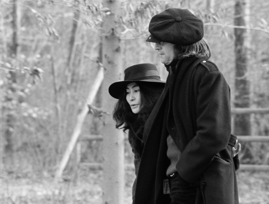 John Lennon and Yoko Ono walking together in New York City, 1973, photographed by Bob Gruen.