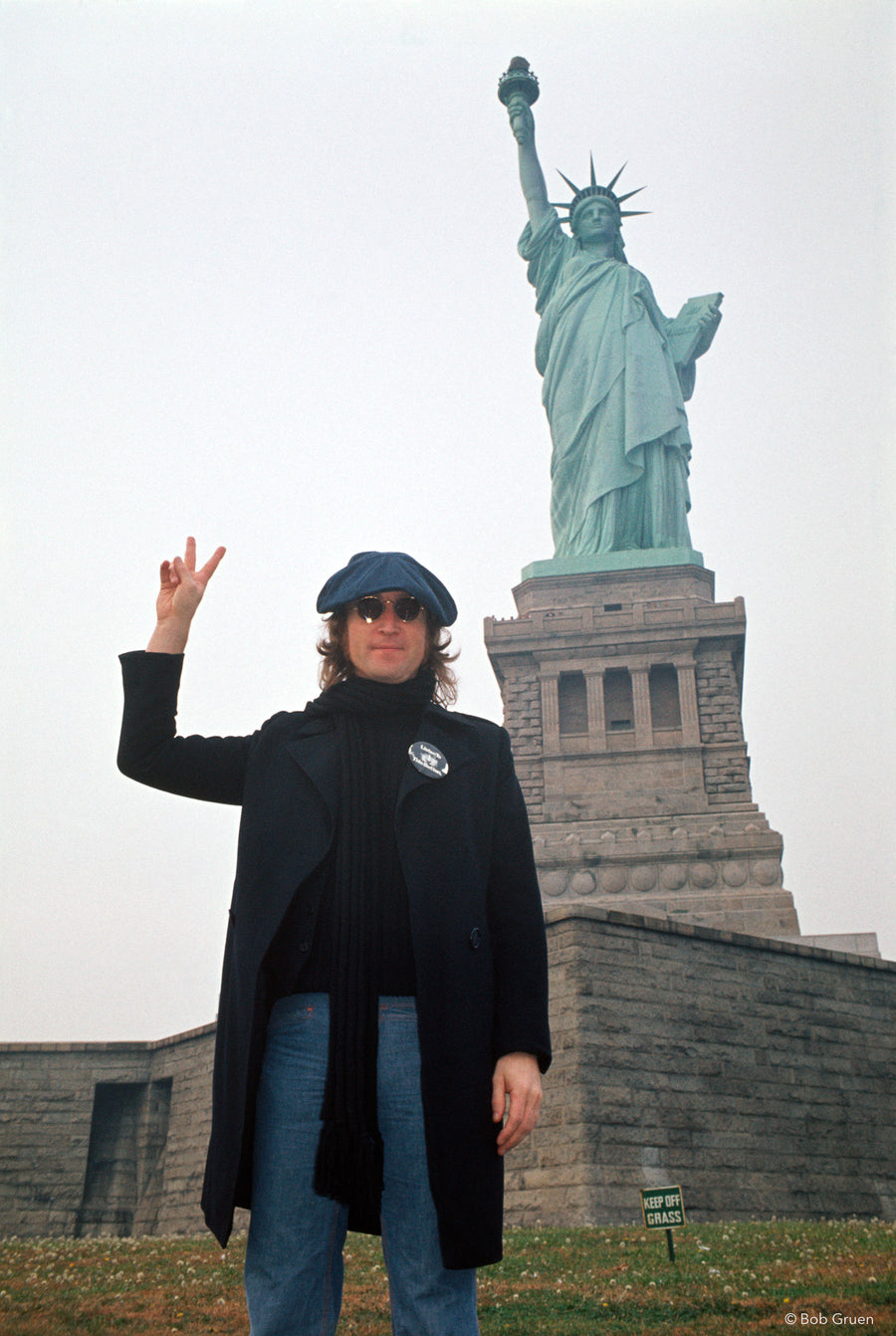 John Lennon at the Statue of Liberty, New York City, 1974, photographed by Bob Gruen.