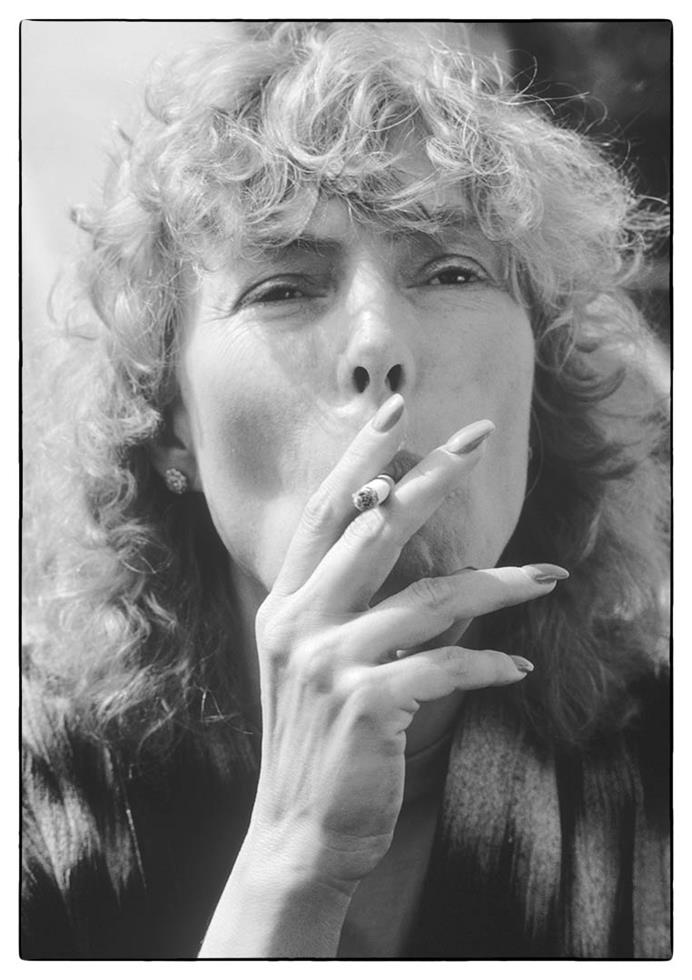 Joni Mitchell performing at Farm Aid in Champaign, Illinois, photographed by Charlyn Zlotnik, 1985.