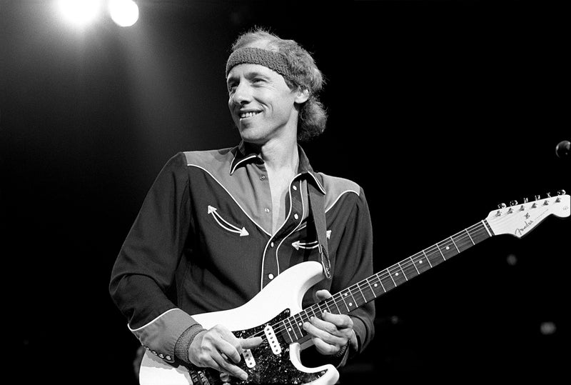 Mark Knopfler, Dire Straits, Madison Square Garden, New York City, 1985. Photograph by Ebet Roberts.