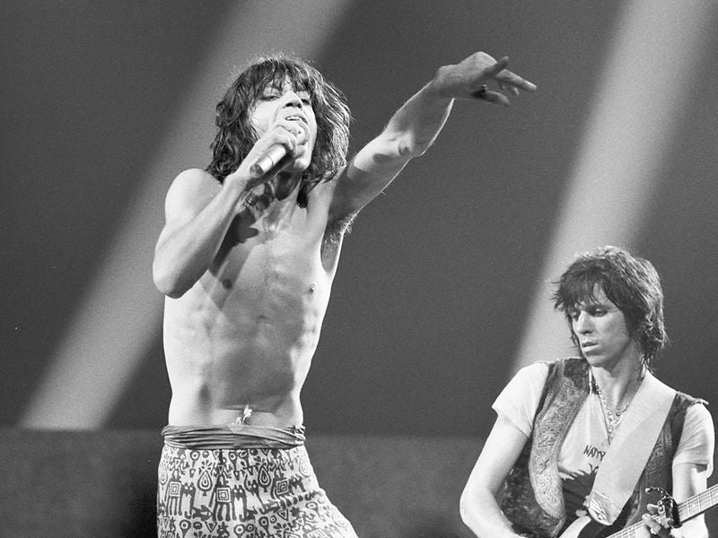 Mick Jagger and Keith Richards performing together onstage in 1974. Photograph by Gijsbert Hanekroot.