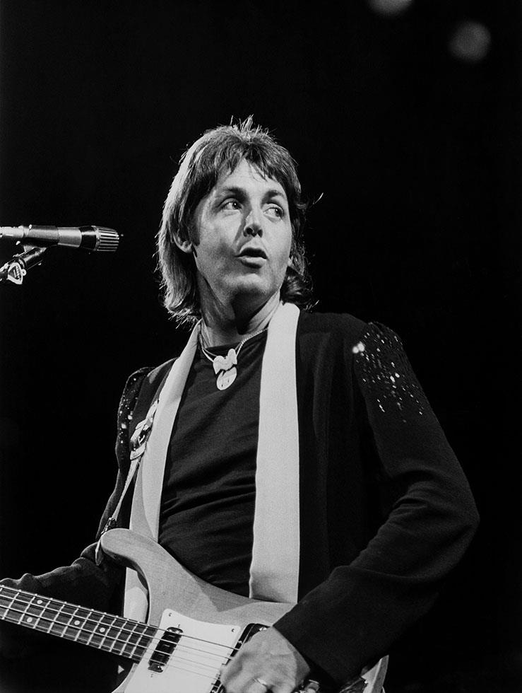 Portrait of Paul McCartney with his Rickenbacker bass, photographed by Charlyn Zlotnik.