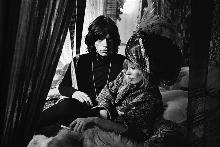 Mick Jagger and Anita Pallenberg on the set of the film Performance, photographed by Michael Cooper, 1968.