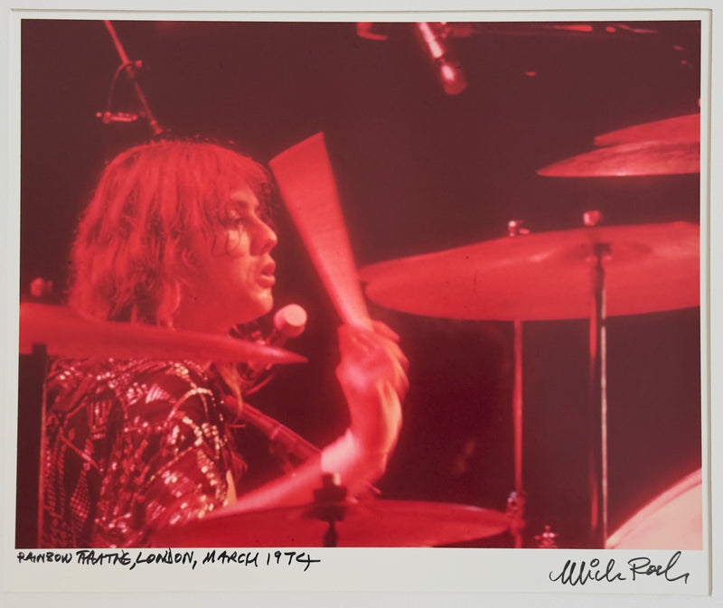 Roger Taylor performing at Rainbow Theatre, London, March 1974, hand-titled and signed by Mick Rock.