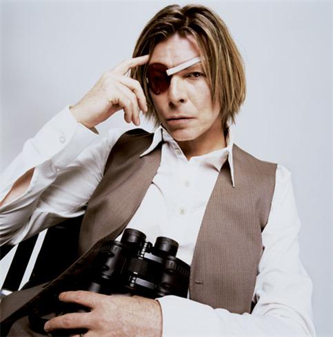 David Bowie with Binoculars, New York City, 2002, photographed by Mick Rock.