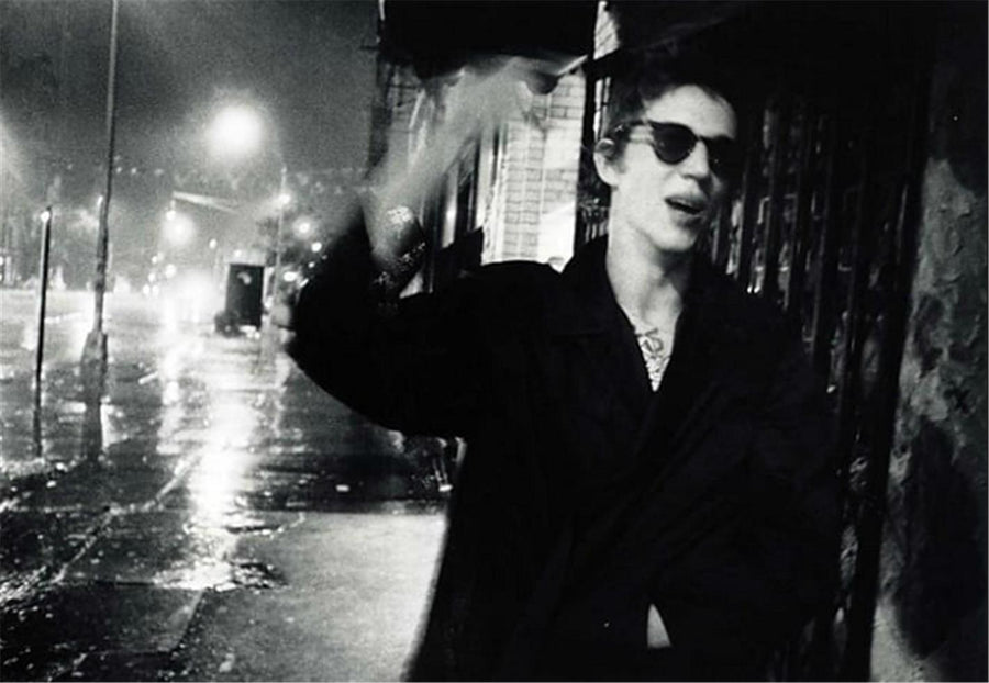Richard Hell in Rainstorm, Bowery, 1977, photographed by Godlis.