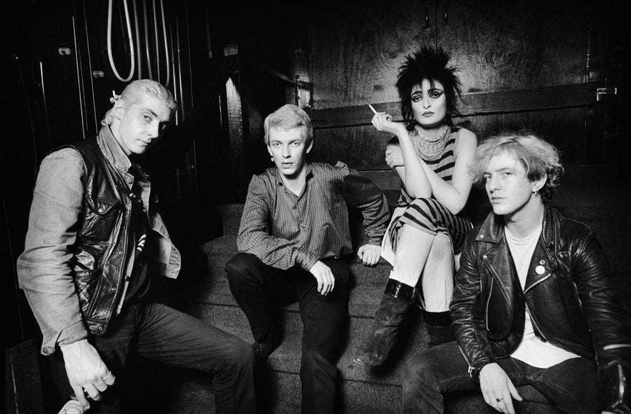 Siouxsie and the Banshees backstage group portrait, Boston, Massachusetts, 1980, photographed by Michael Grecco.