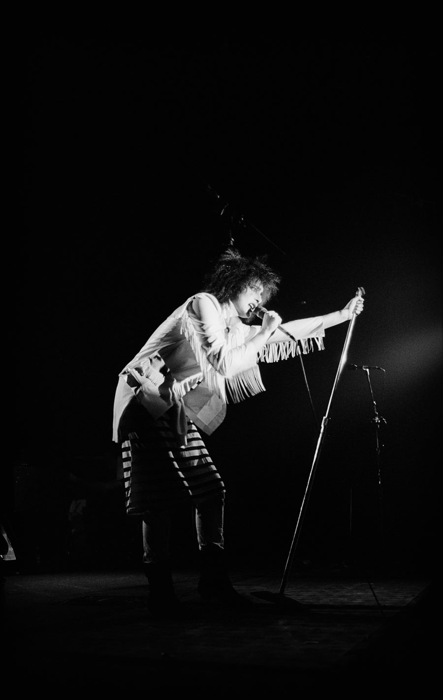 Siouxsie Sioux performing, Boston, Massachusetts, 1980, photographed by Michael Grecco.