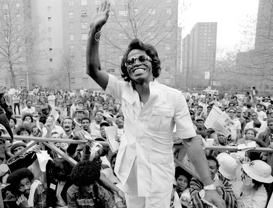 James Brown visits Harlem to meet fans on, 1979