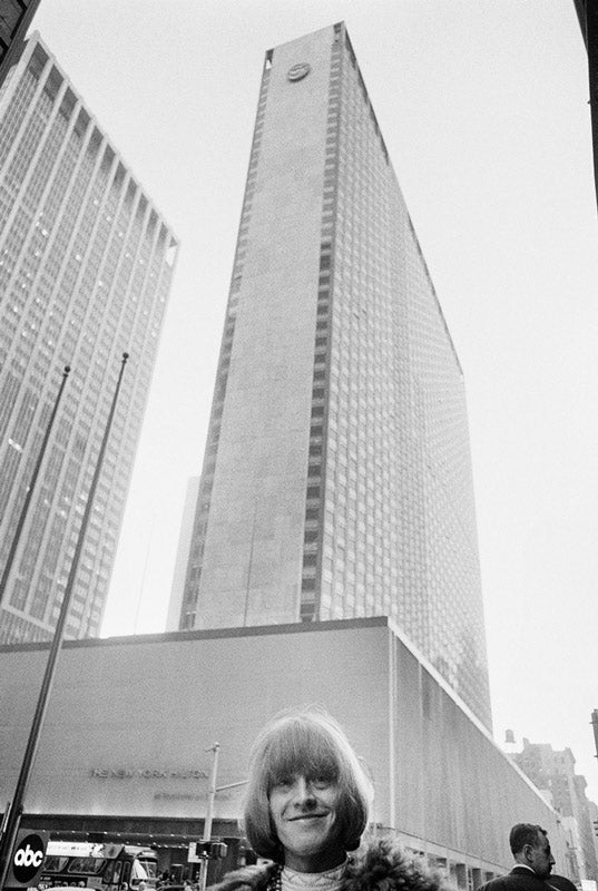 Brian Jones of the Rolling Stones outside the New York Hilton, photographed by Michael Cooper, 1967.