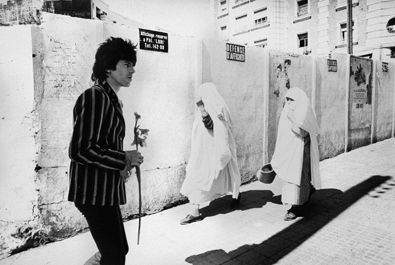 Keith Richards with flowers, Tangiers, Morocco, photographed by Michael Cooper, 1967.
