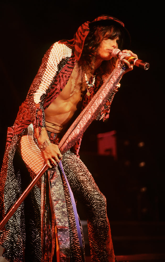 Steven Tyler of Aerosmith, In Concert, 1986, photographed by Lynn Goldsmith.
