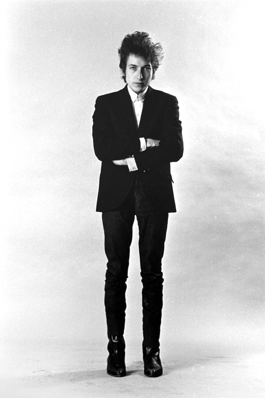Black-and-white studio portrait of Bob Dylan, New York, 1964 — photograph by Daniel Kramer.