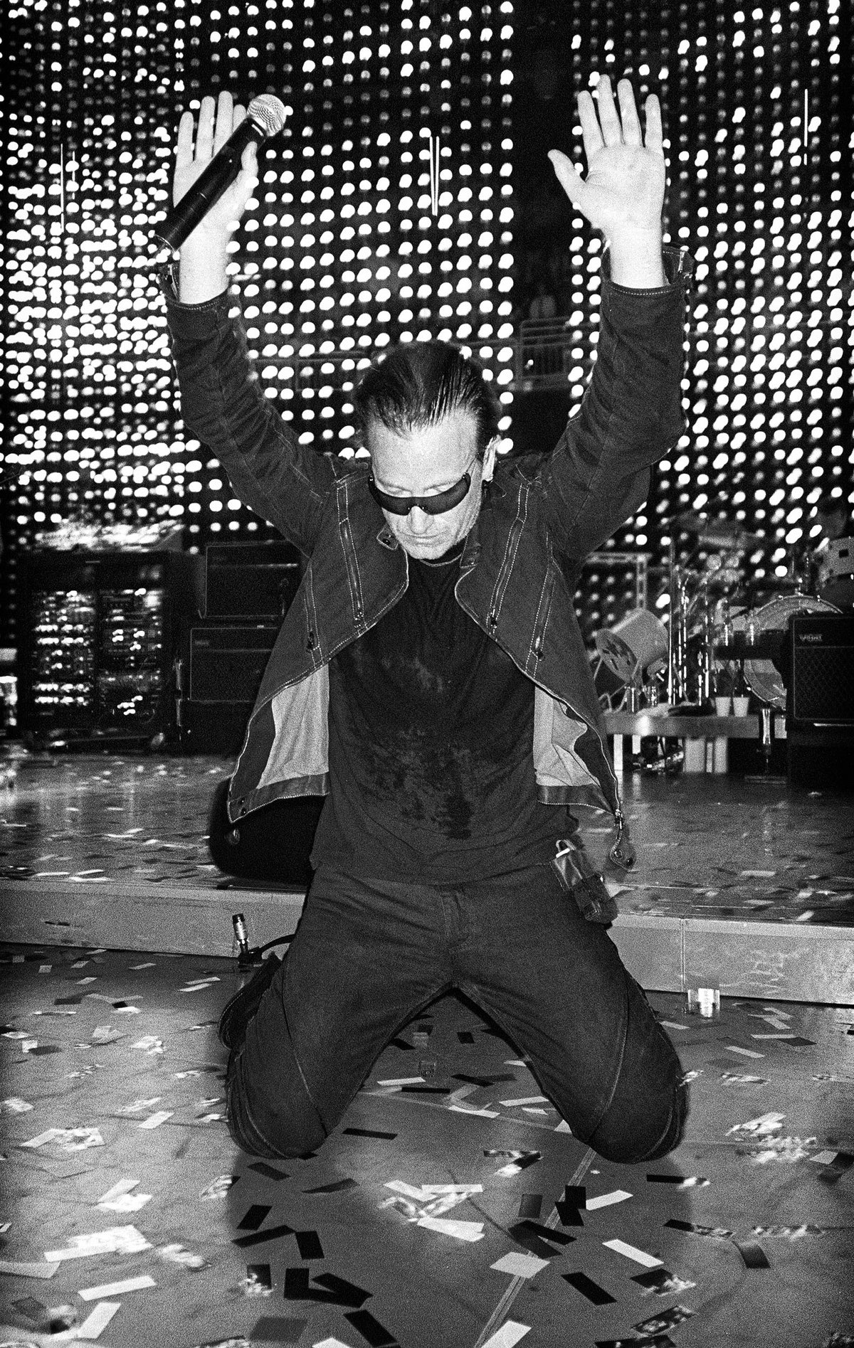 Bono at Glendale Arena, Phoenix, Arizona, 2005, photographed by Jérôme Brunet.