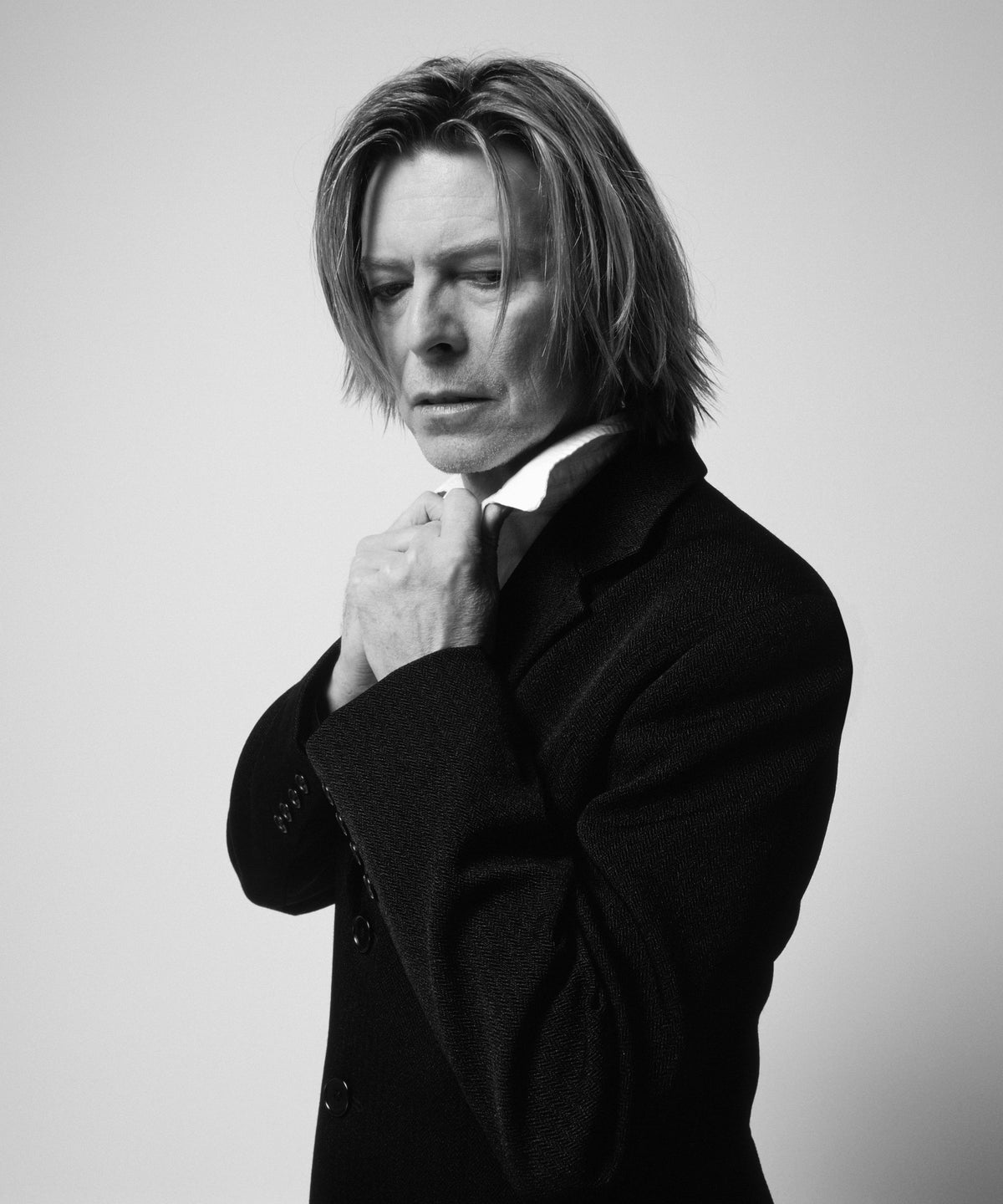 David Bowie in Black Suit, New York City, 2002, photographed by Mick Rock.