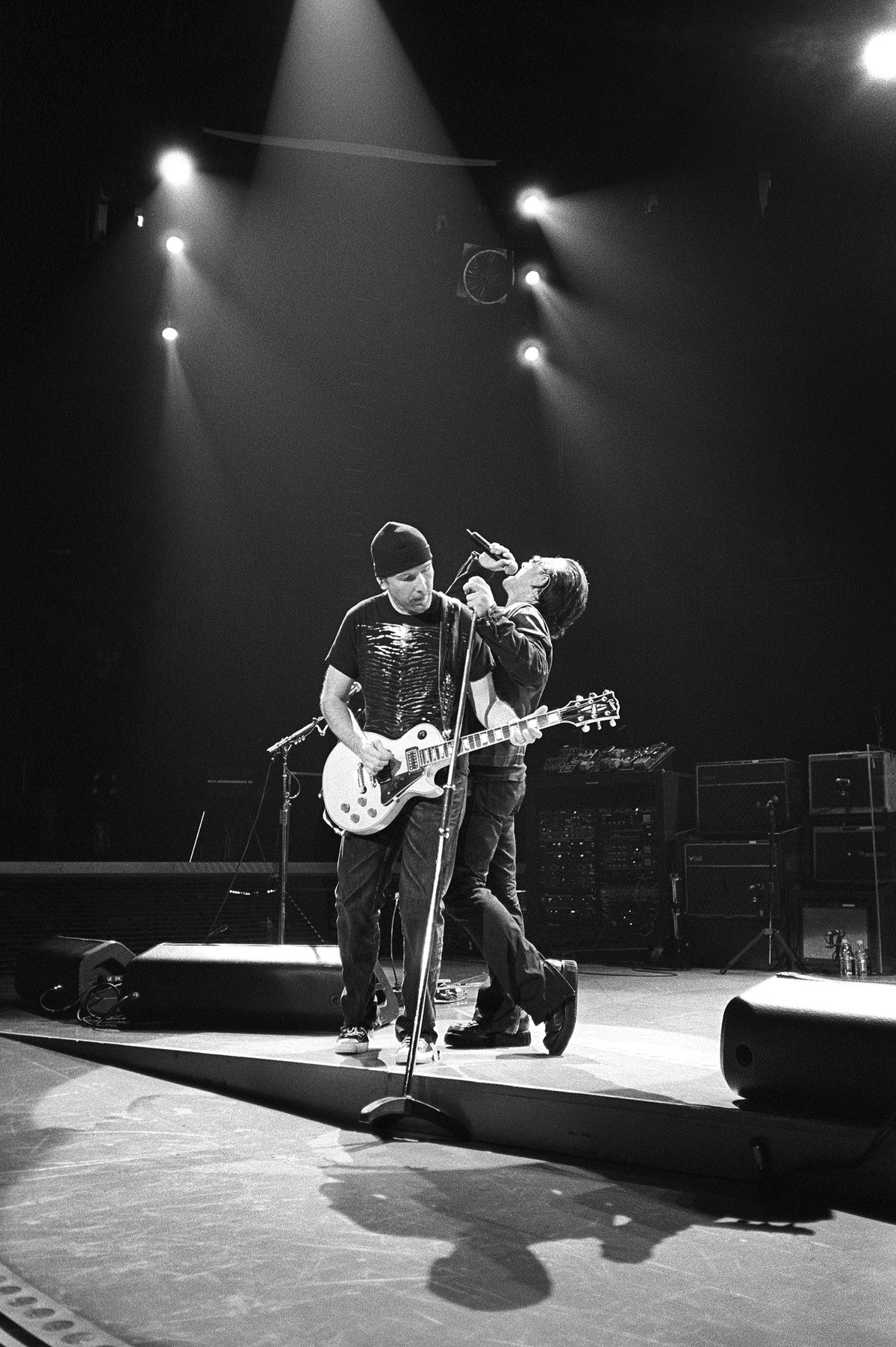 The Edge and Bono at Glendale Arena, Phoenix, Arizona, 2005, photographed by Jérôme Brunet.