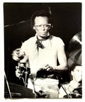 Original vintage gelatin silver print of Miles Davis performing at the Bottom Line, New York City, 1974, photographed by Bob Gruen.