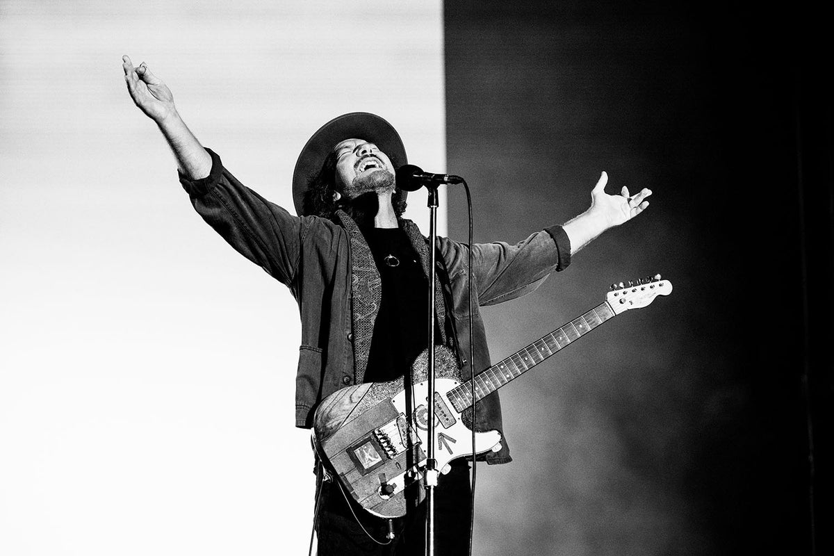 Eddie Vedder with arms open at Ohana Festival, Dana Point, California, 2026, photographed by Jérôme Brunet.