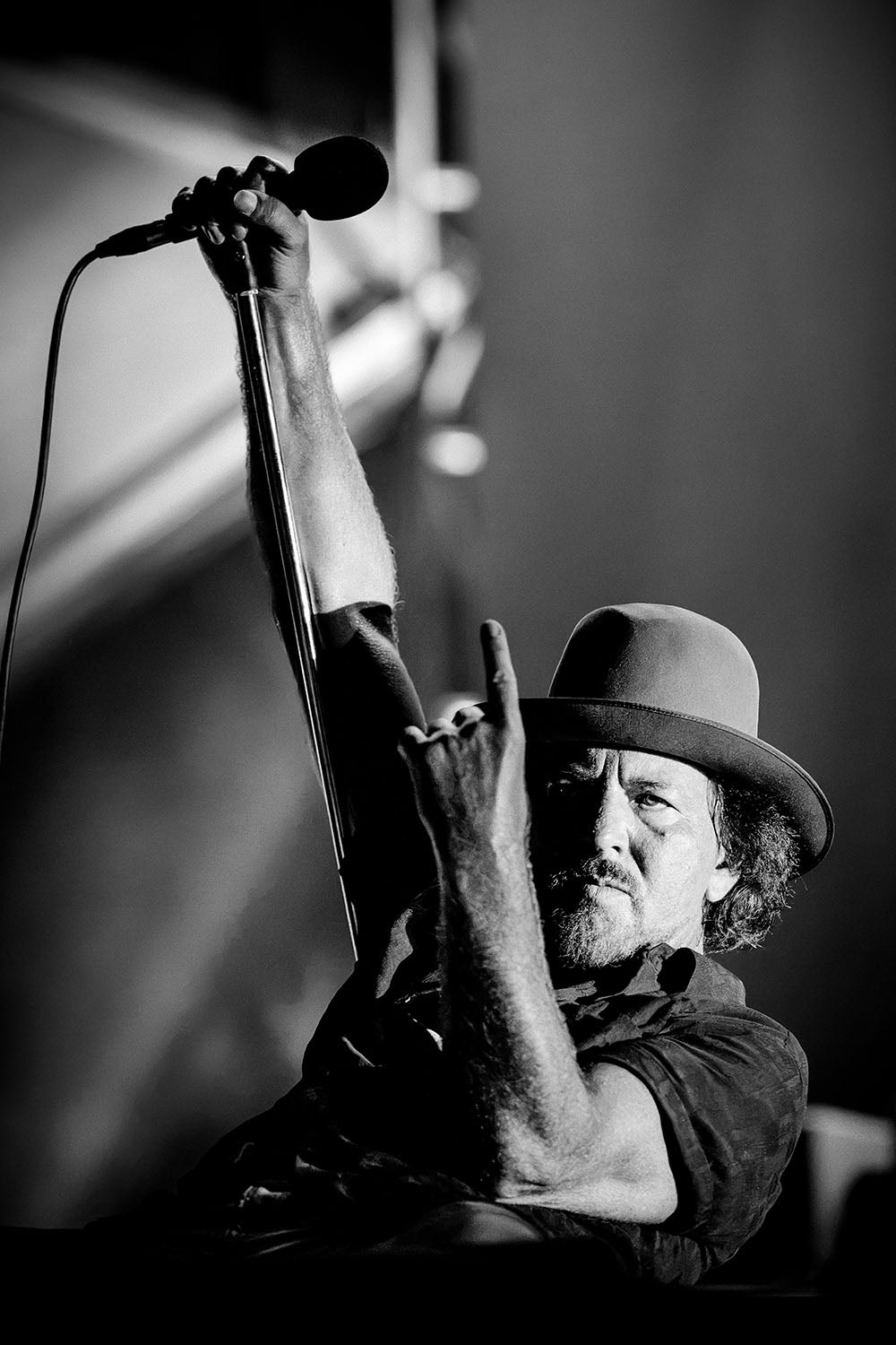 Eddie Vedder raising a rock salute at Ohana Festival, Dana Point, California, 2026, photographed by Jérôme Brunet.
