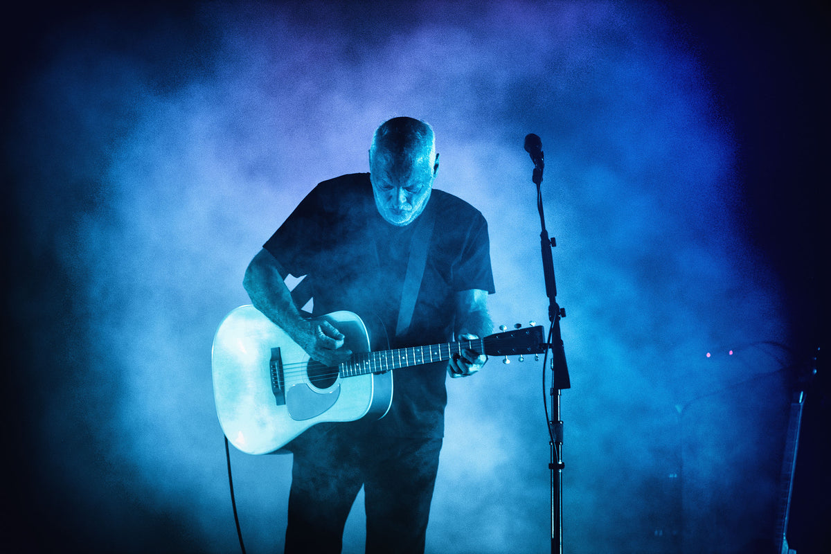 David Gilmour playing acoustic guitar at Intuit Dome, Los Angeles, California, 2024, photographed by Jérôme Brunet.