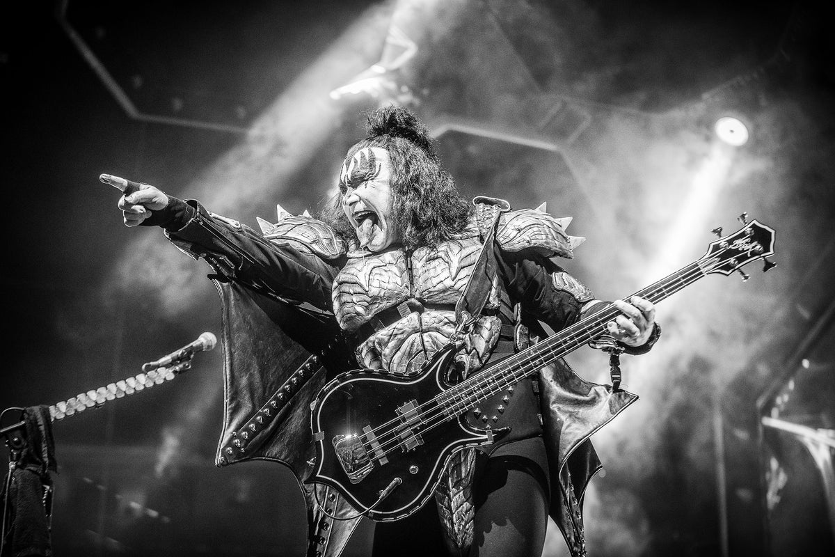 Gene Simmons with tongue out, pointing to the crowd, at T-Mobile Arena, Las Vegas, Nevada, 2019, photographed by Jérôme Brunet.