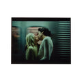 Debbie Harry and Chris Stein kissing on a New York subway train, photographed by Roberta Bayley, 1976.