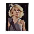 Debbie Harry on the set of Blondie's Heart of Glass video, three-quarter portrait with her gaze turned to the side, photographed by Roberta Bayley, 1978.