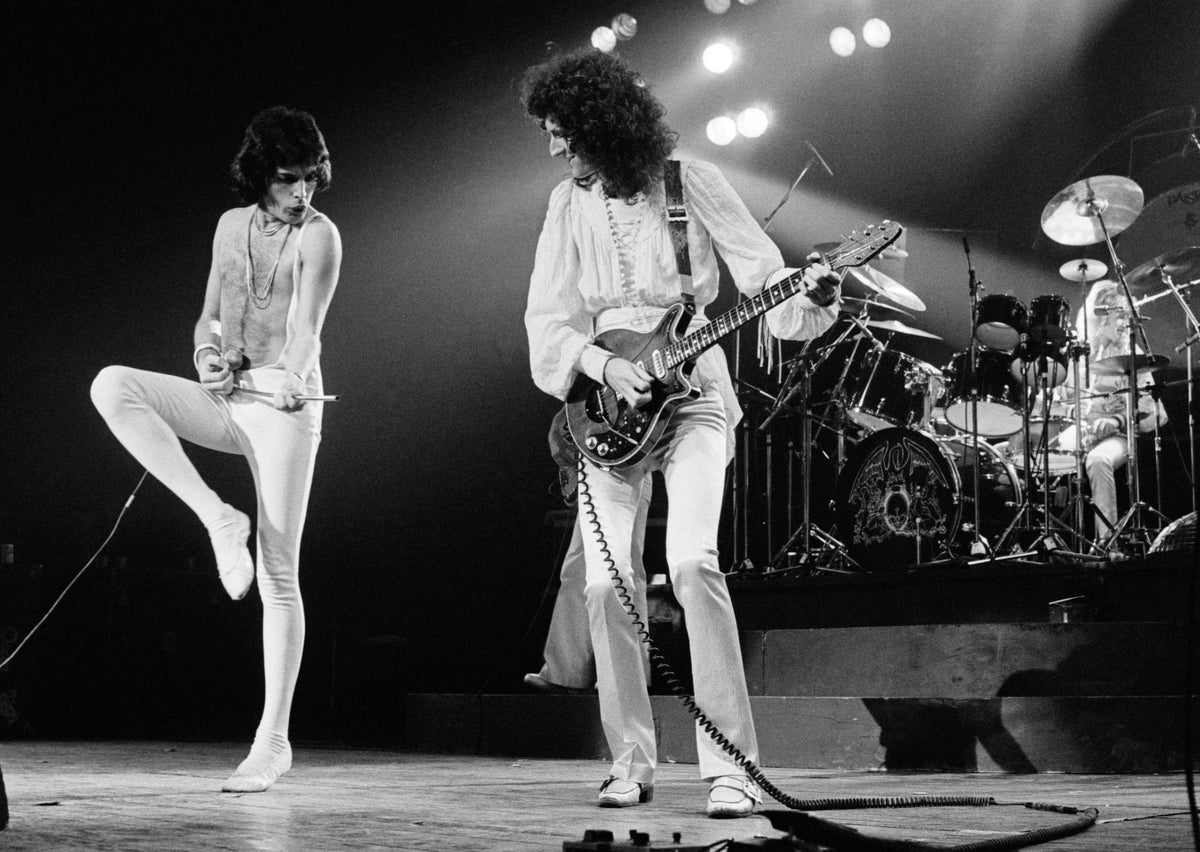 Freddie Mercury, Brian May and Roger Taylor of Queen on stage at Madison Square Garden, New York City, February 5, 1977, photographed by Bob Gruen.