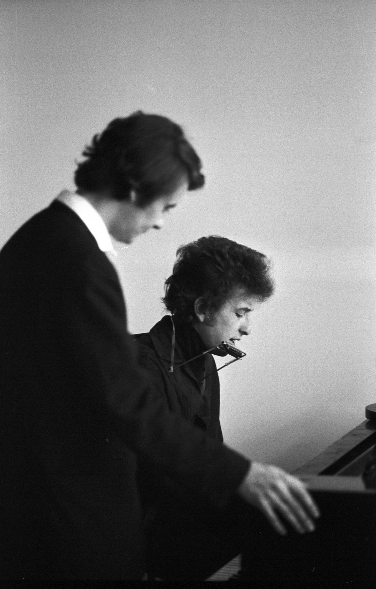 Bob Dylan at the Piano, Philharmonic Hall, Lincoln Center, New York City, October 31, 1964; photograph by John Byrne Cooke.