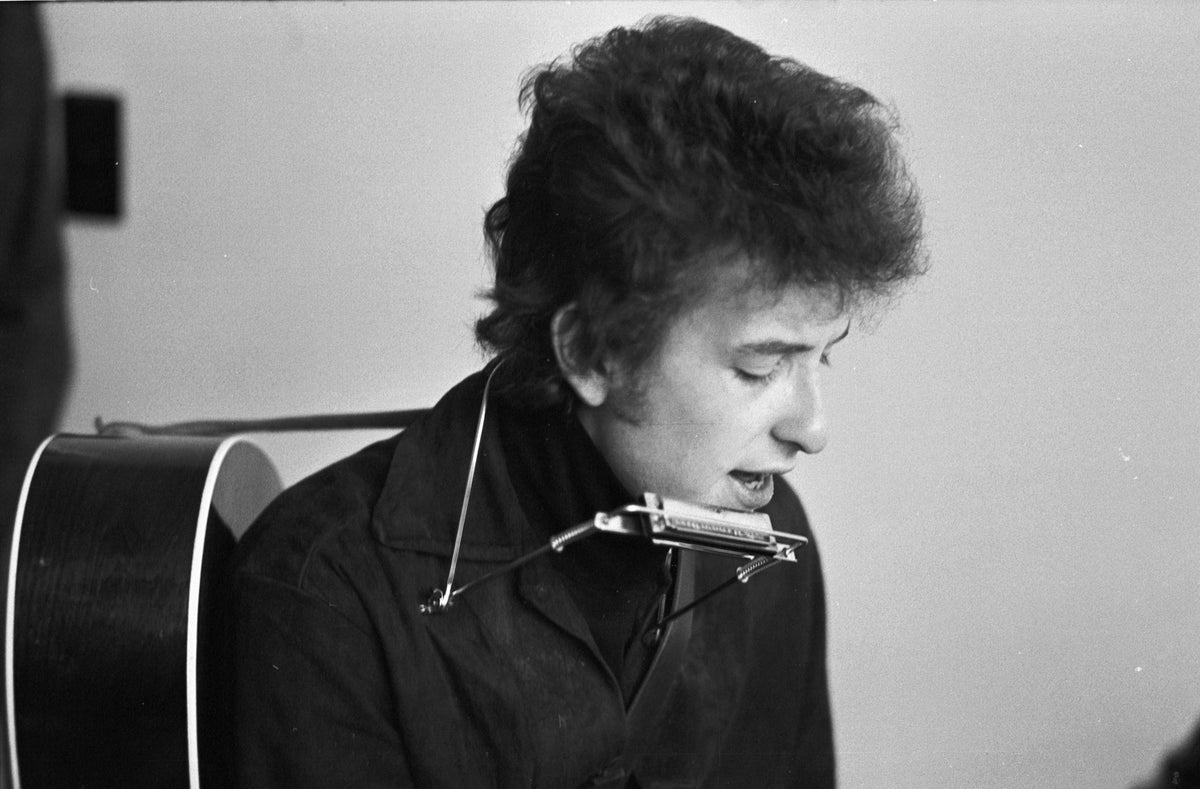 Bob Dylan Playing Harmonica, Philharmonic Hall, Lincoln Center, New York City, October 31, 1964; photograph by John Byrne Cooke.
