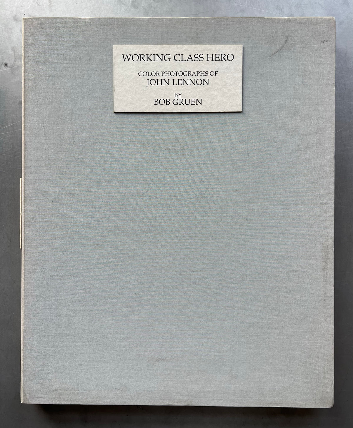 Bob Gruen, Working Class Hero Portfolio, original acid-free cloth-covered presentation box with engraved bronze title plaque, 1990.