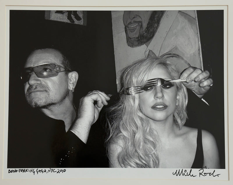 Bono and Lady Gaga in New York City, 2010, hand-titled and signed by Mick Rock.