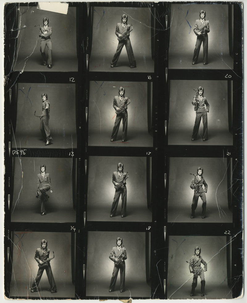 David Bowie with saxophone during the 1973 Pin Ups Sax Series session, photographed by Mick Rock. Unique vintage gelatin silver print.