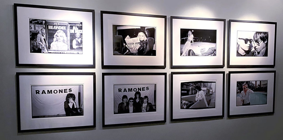 Installation view of framed Chris Stein photographs of Blondie and the Ramones in Buenos Aires, 2020.