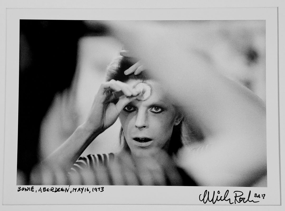 David Bowie backstage in Aberdeen, 16 May 1973, during the Ziggy Stardust tour — photograph by Mick Rock, a signed, hand-titled late print.