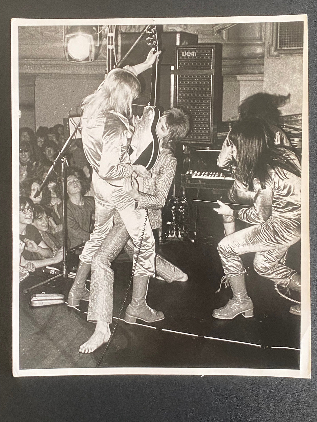 David Bowie and Mick Ronson in the Guitar Fellatio image, 1972, photographed by Mick Rock. Unique vintage gelatin silver print.