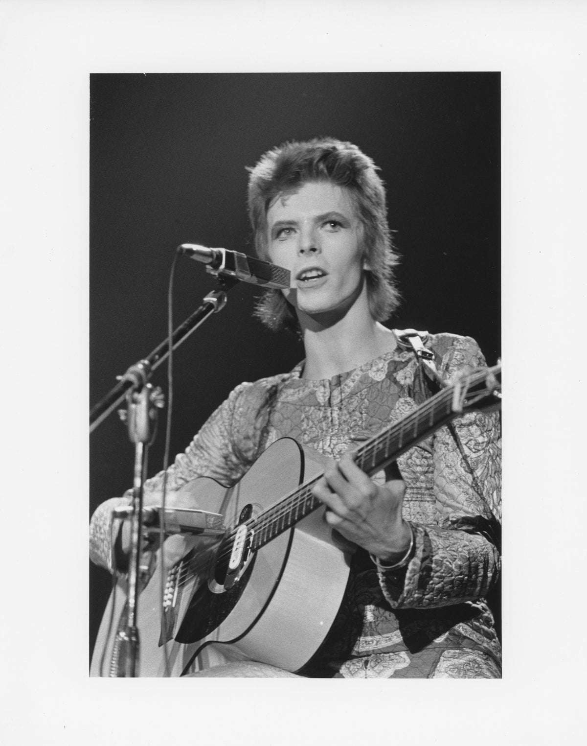 David Bowie performing at Carnegie Hall, New York City, 1972, photographed by Mick Rock. Unique vintage gelatin silver print.