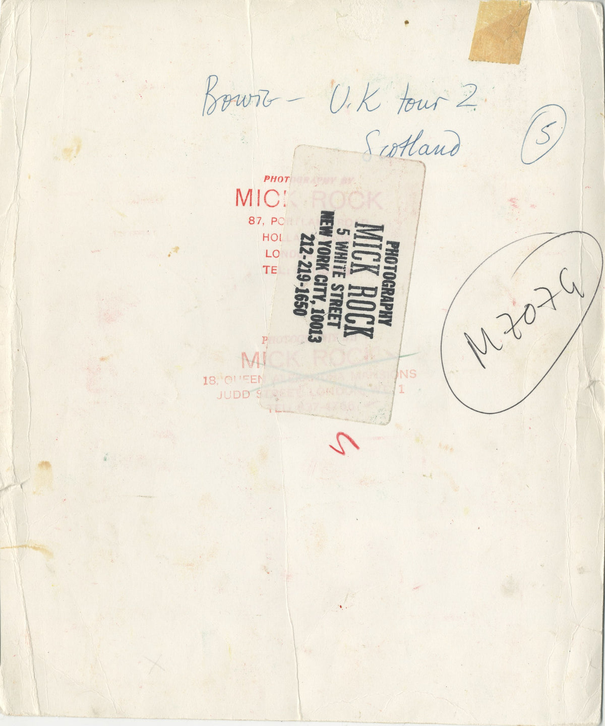 Verso of the David Bowie Scotland tour backstage contact sheet, hand-annotated and stamped by Mick Rock.