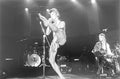 David Bowie performing on stage on the 1973 UK tour, photographed by Mick Rock. Unique vintage gelatin silver print.